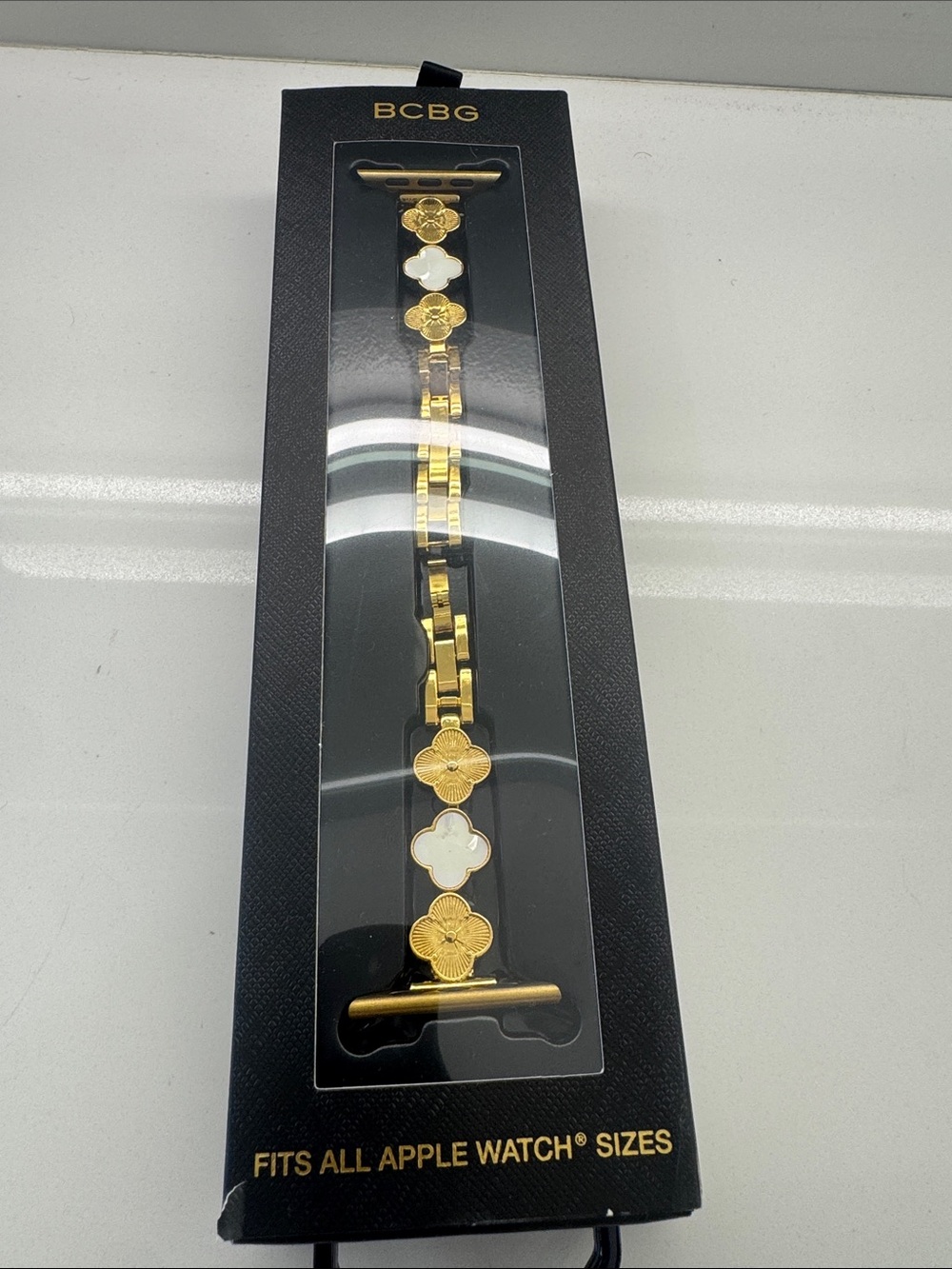 BCBG Gold and White Floral Link Apple Watch Bracelet